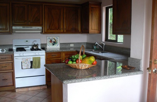 Atenas House | Private villa with lush tropical garden and big heated pool