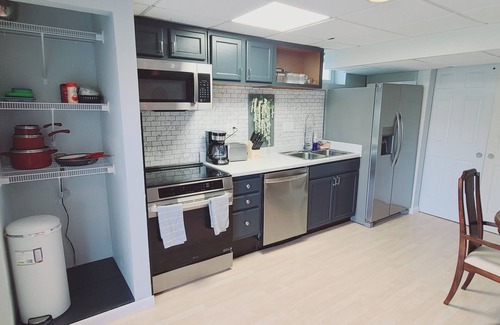 Treloar House | Private walkout basement: 2 queen beds & full bath