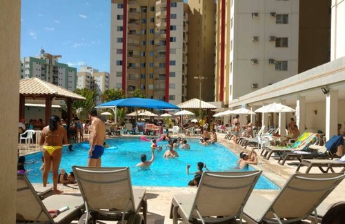 Do Turista Apartment | Privé das Hhermas, 2 bedrooms one suite kitchen and living room with TV
