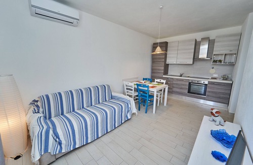 Trinita d'Agultu e Vignola Apartment | Provided one-bedroom ground floor apartment a stone's throw from the sea, in a lively and serviced area