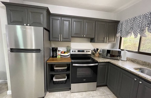 Coco Condo | Professionally decorated condo minutes from beaches and restaurants.