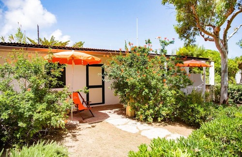 Chiesiola Resort | Property in a Holiday Village 'Baia Falcone - Standard 301' with Sea View and Air Conditioning