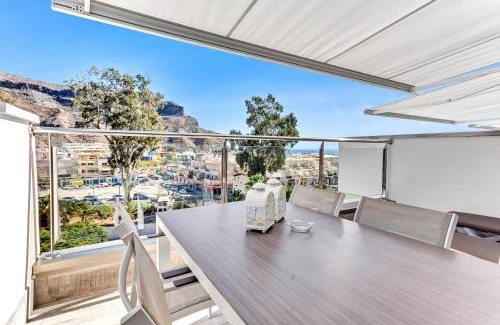 Lomo Quiebre Apartment | Puerto de Mogan - Luxe Apartment with roof terrace and sea view
