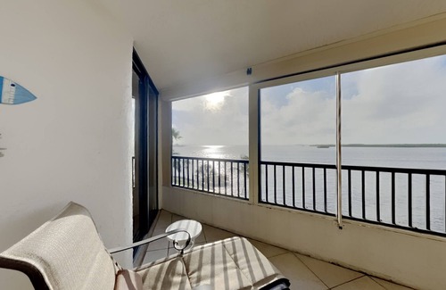 Punta Rassa Condo | Punta Rassa #404 TRANQUIL SPACIOUS 2 BED CONDO WITH GORGEOUS SUNSET WATER VIEWS