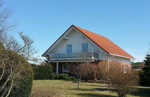 Mecklenburgische Kleinseenplatte Apartment | Pure relaxation with a view of the Vilzsee.