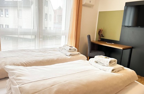 Detmold Hotel | Qonroom - Detmold - shared kitchen - BBQ - App9