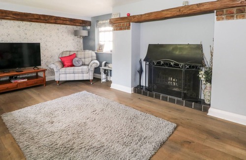 Wilmslow Cottage | QUAKER COTTAGE, pet friendly, with a garden in Wilmslow