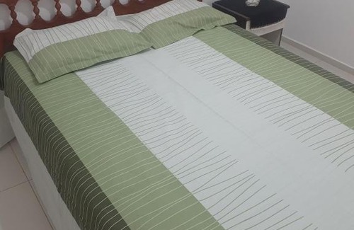 Suzano House | Quarto em apartamento