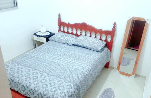 Suzano House | Quarto em apartamento