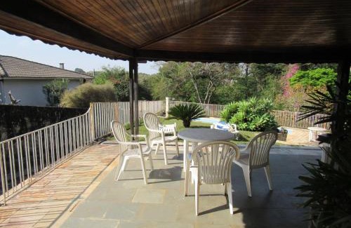 Vila Gardenia House | Quarto Suíte Pitanga