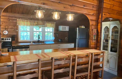 Paw Paw Cabin | Quiet Log Cabin with private river access and hot tub