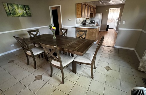 Lander House | Quiet neighborhood, relaxing wrap around deck with fire pit. Short walk to town.