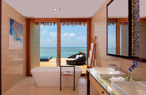 Huruelhi Island Resort | Radisson Blu Resort Maldives with 50% off on Sea Plane round trip SPA 03 nights & above