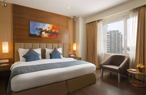 Prahlad Nagar Hotel | Ramada by Wyndham Ahmedabad