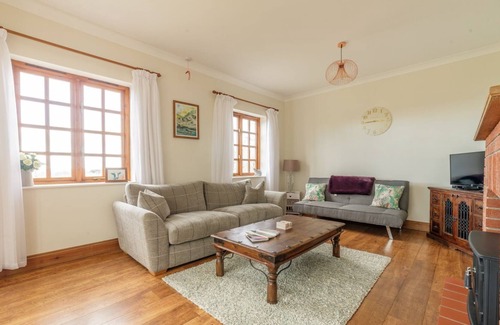 Sulby House | Reayrt Aalin is located in a peaceful rural setting just a few minutes from Ramsey in the north of t