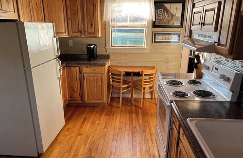 West Bath Cottage | Recently renovated cottage just steps to the waters edge deck, and dock along the New Meadows River.