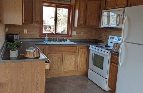 Hulett House | Red Bluffs Lodge Upper Unit, located on the River, minutes from Devils Tower!
