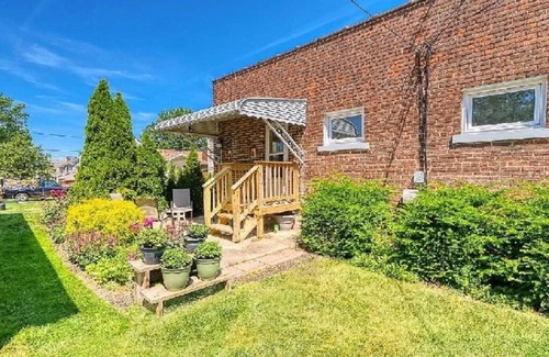 Garfield Heights Apartment | Red Brick Chalet-20 min to CCF/UH Main Campus & Downtown!