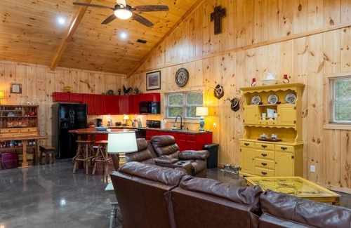 Springville Cabin | Red Cabin on Kentucky Lake. Peaceful and pet friendly with a partial lake view.