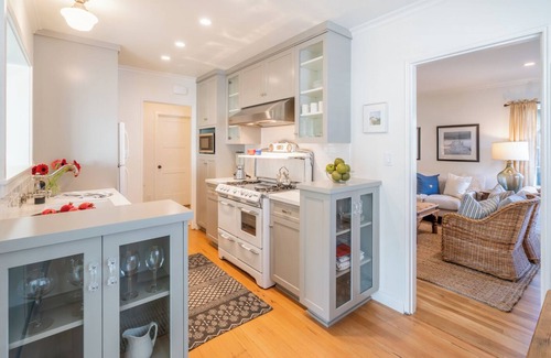 West Beach Condo | Refined Coastal Escape a Block from West Beach!