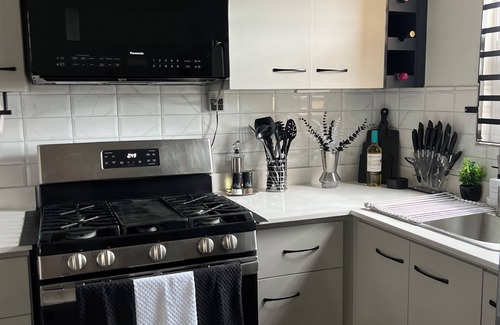 Portmore House | Refined luxury awaits you, where sophistication reigns with a Taste of Opulence!