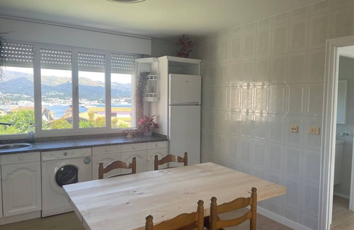 Puebla del Caraminal Condo | Refurbished house 7 minutes walk from the beach, overlooking the Ria de Arousa.