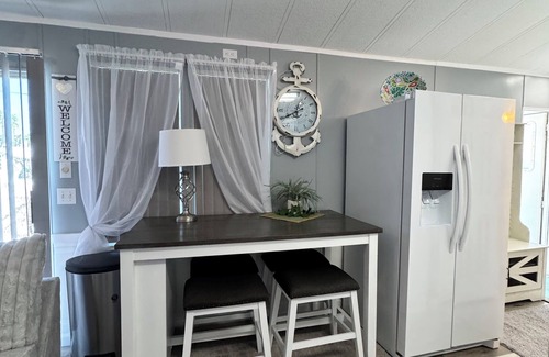 Live Oak Landings House | Relax and unwind in our inviting 55+ Mobile Home park, on the Gulf and the Bay,