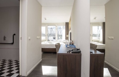 Ellecom Hotel | Relax in Luxury: Comfortable Room with Garden Views in Ellecom