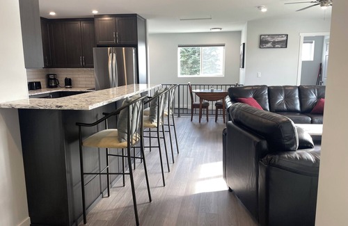 Vernon Apartment | Relax on the deck and enjoy the beautiful lake views, in the North Okanagan