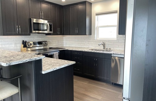 Vernon Apartment | Relax on the deck and enjoy the beautiful lake views, in the North Okanagan