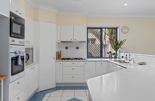 Banksia Beach House | Relaxation & Space in a Canal Home