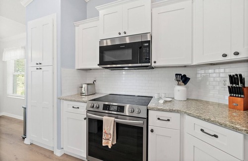 Palm Coast House | Relaxing 3bd Pool Home w/Lanai & Lush Backyard