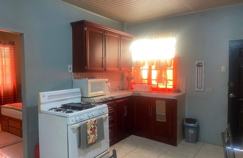 Penal-Debe Apartment | Relaxing, family-friendly 2-bedroom apartment with A/C, WiFi & Central Location