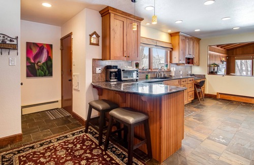 Broadmoor House | Relaxing Home with Private Hot Tub, Fast WiFi, Gas Fireplace, and Washer/Dryer