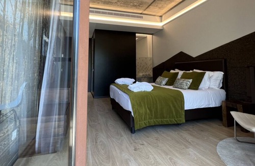 Balocas House | Relaxing Apt. w/ Balcony and Full Kitchen | Indoor Pools + Spa