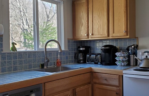 South Britain House | Remodeled 1795 Carriage House with two acres of gardens rimmed by forests