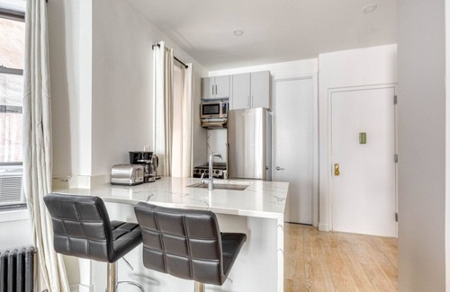 SoHo Apartment | Renovated SoHo 1BR w/W/D, nr Nolita, by Blueground