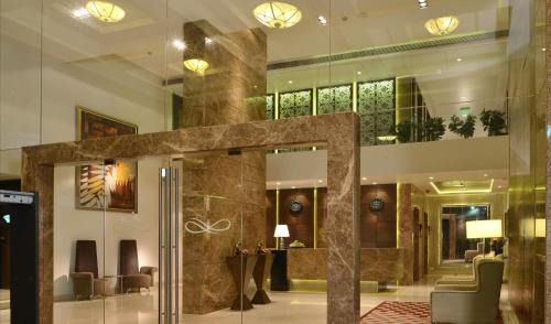 Malad West Hotel | Residency Sarovar Portico