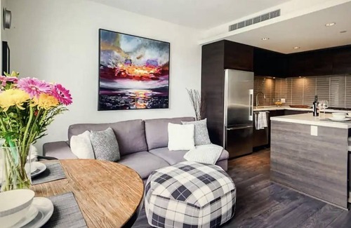 District of North Vancouver Apartment | Resort Style Living apartment with mountain view, pool, gym and more!