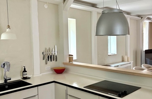 Copenhagen K Apartment | Restored 1880 Grain Warehouse in Peaceful Courtyard Near Royal Palace & Church