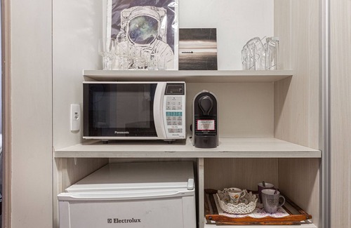 Cerqueira Cesar House | Retro flat unit in the heart of Jardins