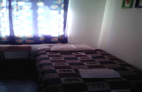 Victoria Falls Cabin | Rhinoceros Room accommodating 2