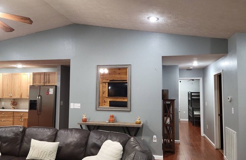 Cosby Cabin | Riverfront cabin near the Smoky Mountains with a hot tub.