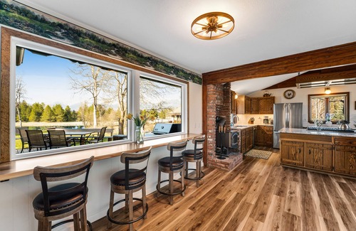 Bigfork House | Riverfront home with private dock, kayaks, 150+ ft Swan River frontage - dogs OK
