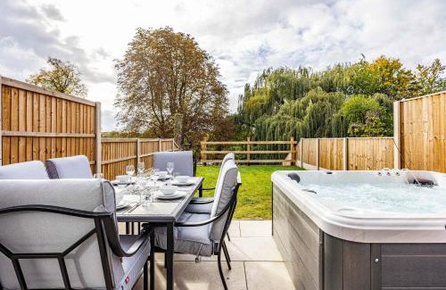 Borrowash House | Riverside Hot Tubs Fishing Games Area