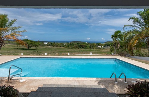 Esperanza House | Rock/Pool Houses. 2 houses with view of ocean and 5 minute drive to beach!