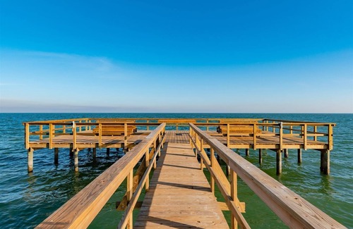 Sailhouse House | Rockport Racquet and Yacht Club condo with lovely bay views, tree covered grounds, pool, and fishing!