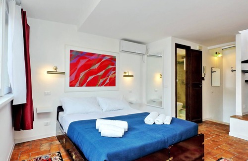 Monti Apartment | Romantic attic with a wonderful terrace, near the Colosseum