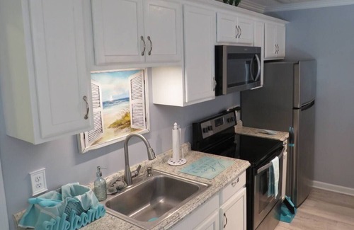 Emerald Isle Apartment | Romantic Celebrations Meet the Beach! [Suite Paradise]