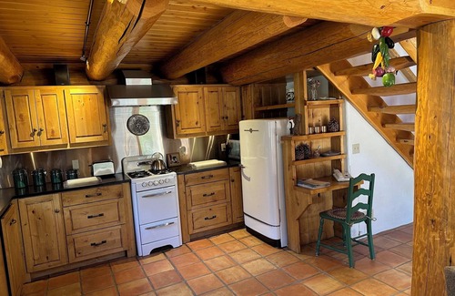 June Lake Cabin | Romantic log cabin getaway with spectacular mountain views.nSTR AP 18-005